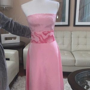 Baby pink dress can be work at a wedding or prom